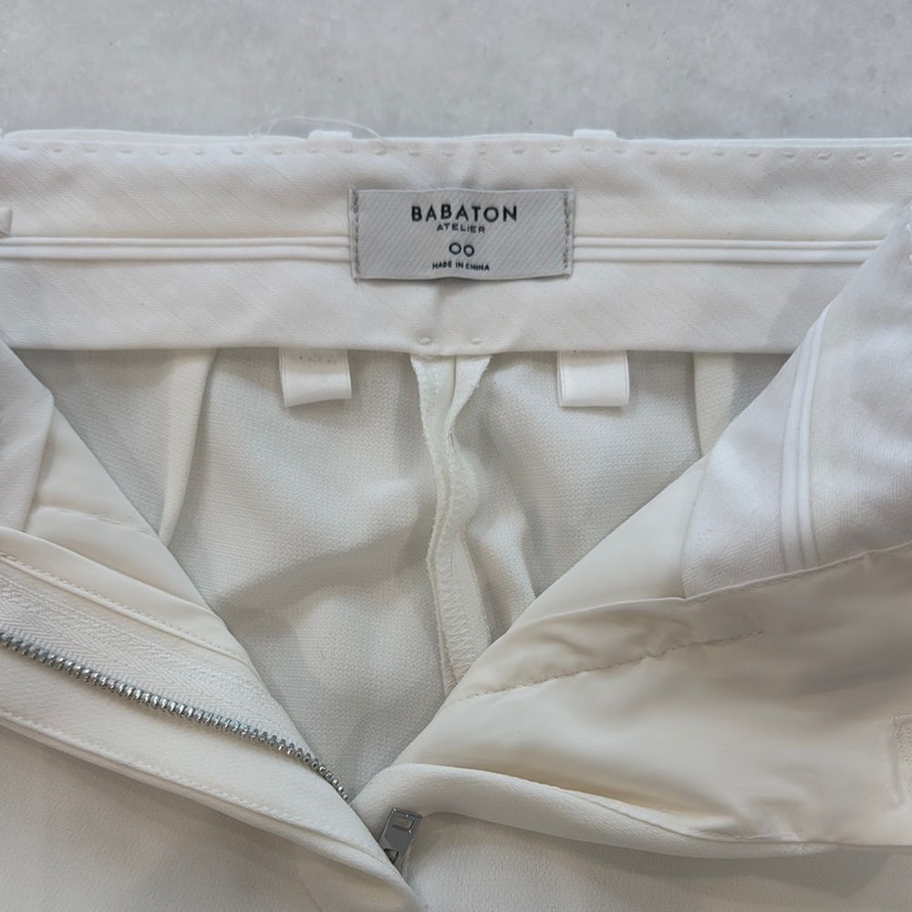 Babaton White High Rise Jeans with Smooth Finish